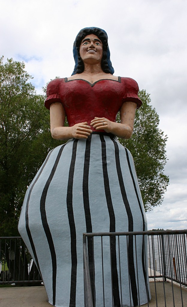Paul Bunyan's sweetheart, Lucette, stands next to the library along Birch Lake.