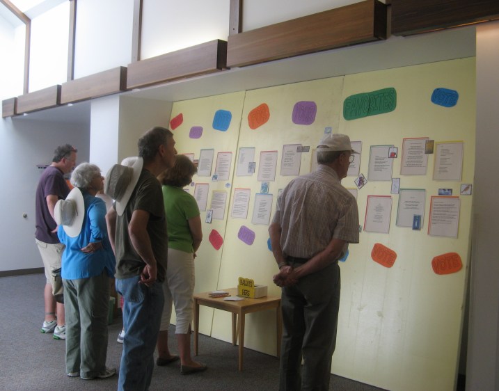 Attendees at the Northwoods Art & Book Festival view showcased poems and then vote for their favorite in the Popular Choice awards.