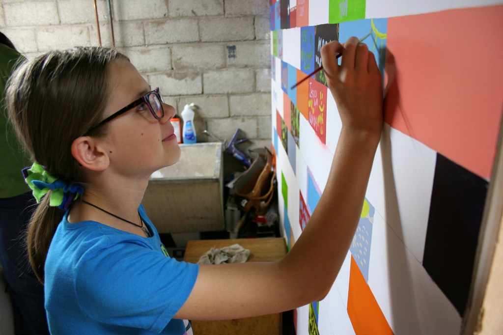 See, I really was busy taking photos, here of Hannah. She's quite the artist who not only paints, but also sews. Plus, she writes poetry.