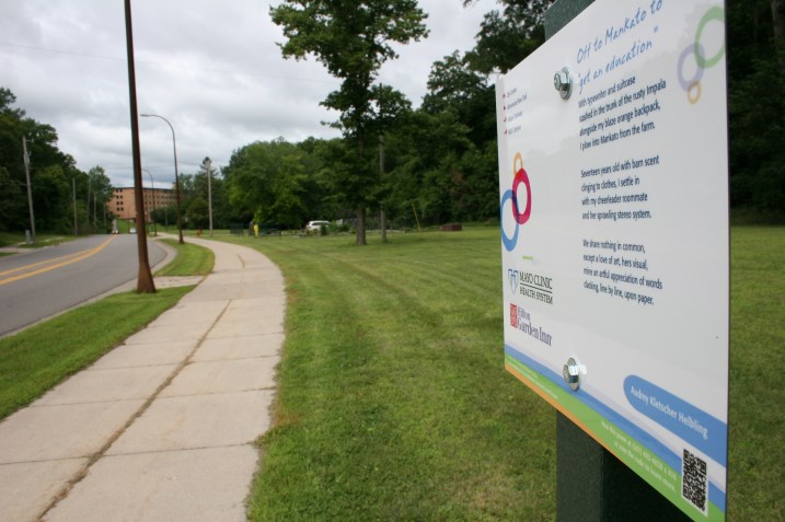 "Off to Mankato to 'get and education'", posted near Glenwood Gardens, in the background in this photo.