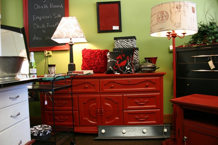 The red dresser/buffet is priced at $295.