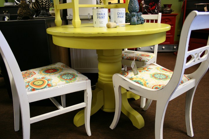 This yellow table can be yours for $160. The chairs are $65/each.