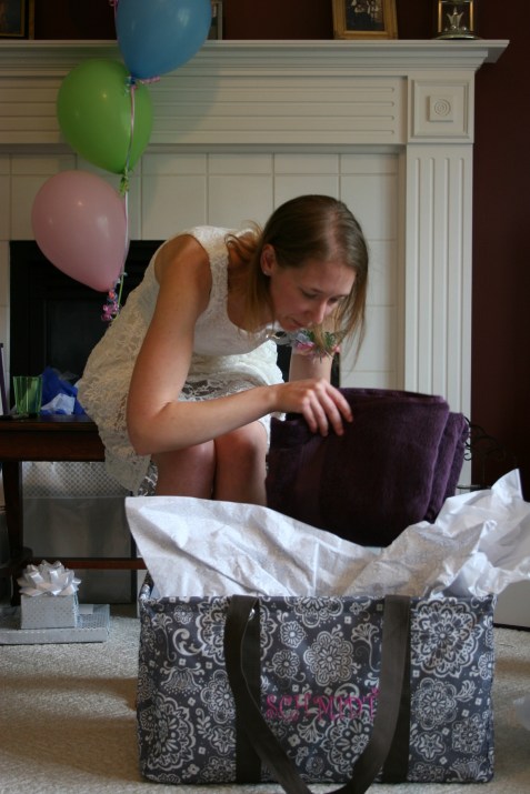 She was gifted with a personalized bag bearing her new last name of Schmidt.