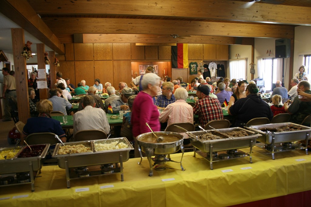 The social hall and rooms off the dining area were filled with diners.