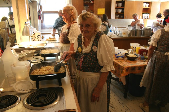 Some of the St. John's kitchen crew, including long-time member Elsie Keller who is making German potato salad.