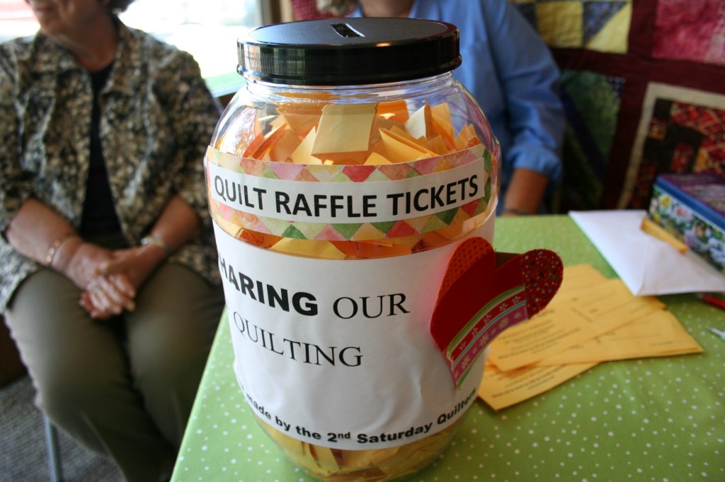 My husband and I each bought a quilt raffle ticket.