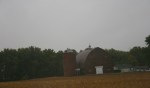 Harvest time, brick barn along Hwy&nbsp;14