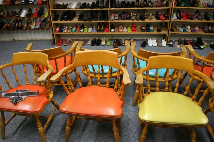 Colorful vintage chairs in the basement.
