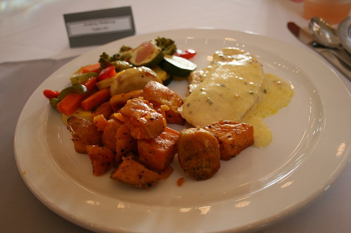 Faribault based Arna Farmer Catering catered the meal of chicken breast in white wine sauce, roasted sweet potatoes and a mixed vegetable medley. Dessert of apple crisp and bars was served later. There was no wedding cake.