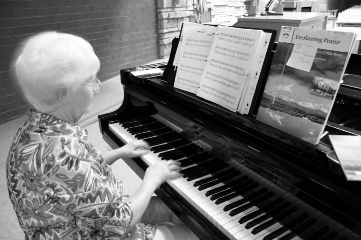 Barb, the pianist, practices.