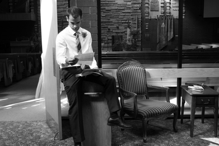 Tim, an usher, waits.