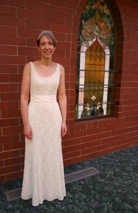 When my daughter tried on this dress, we all knew, just knew, it was the one for her. She had it taken in and a sash added with no other alterations made.