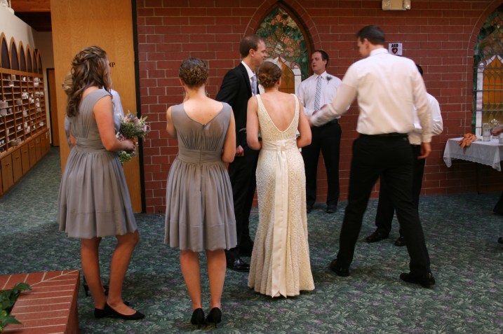 The bridal party awaits the beginning of their photo shoot.