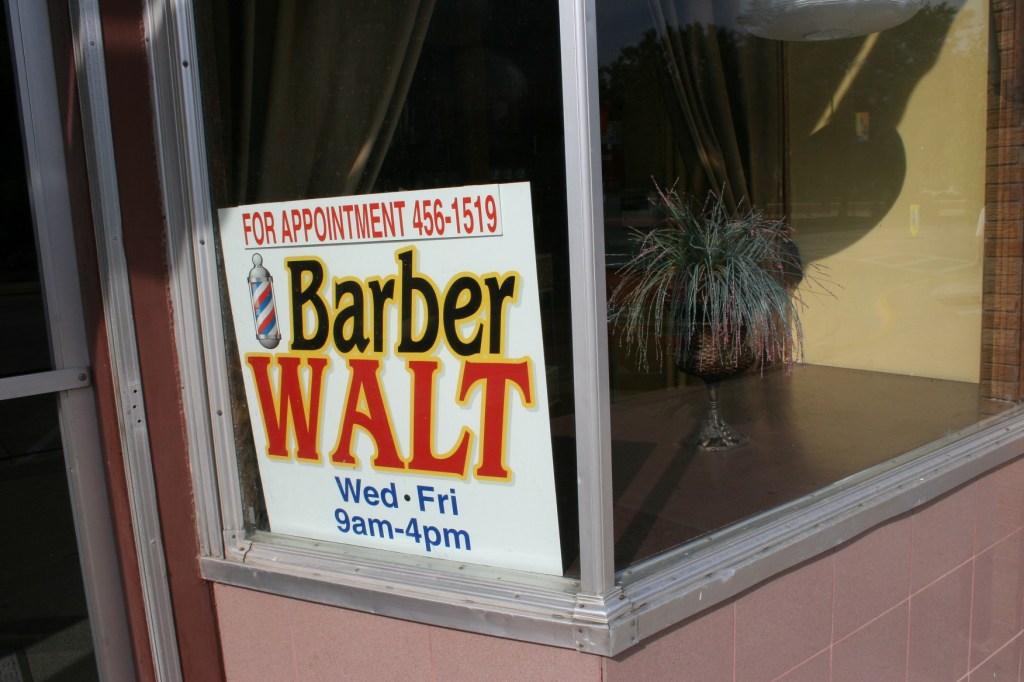 Over in Owatonna in the afternoon, I shot this signage in the heart of downtown. Walt the Barber. I expect he could spin a story or ten.