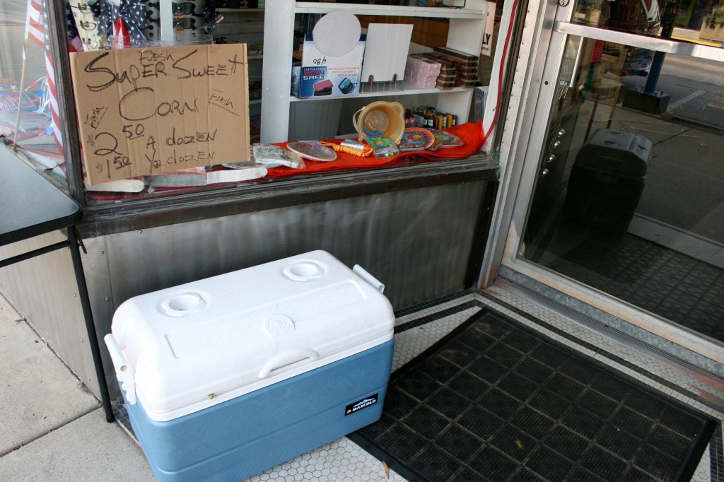 On the opposite side of the street from the bank, I spotted this cooler of fresh sweetcorn outside of Party-Plus of Owatonna.