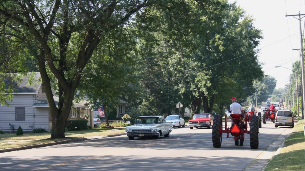 Mid-morning Saturday, while I was watering my flowers, a mini tractorcade puttered past my Faribault home. By the time I realized what I was seeing and retrieved my camera from my office, I