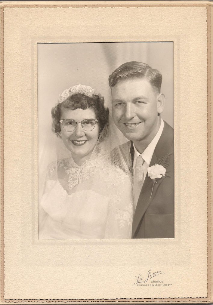 Amber and Marc wanted to honor their parents and grandparents at their wedding reception and did so with wedding day portraits, like this of my parents, Elvern and Arlene, married on September 25, 1954.