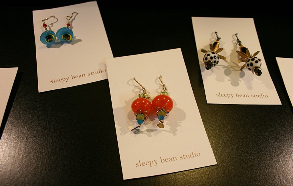 Earrings, featuring handcrafted beads, created by Annie Larson of Sleepy Bean Studio.