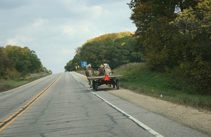 An Amish man traveling Wisconsin State Highway 21 on Friday, October 11, 2013.