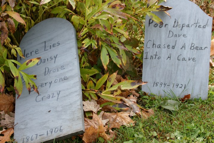 Among the humorous tombstones on display.