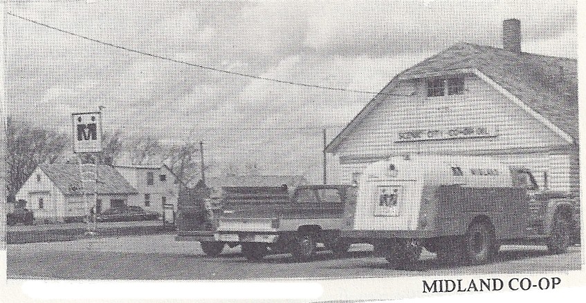 My uncle's gas station with the fuel delivery truck parked by The Old Log Cabin. Photo from Envisioning a Century, Vesta, 1900-2000.