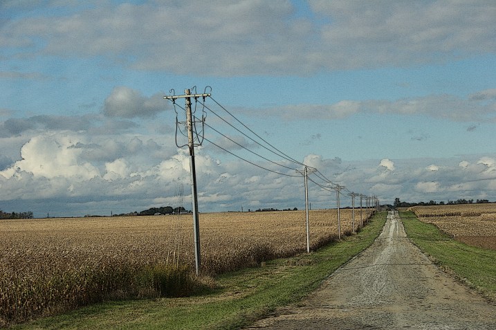 Strong lines pull me in, lead me to wonder where that gravel road would take me.