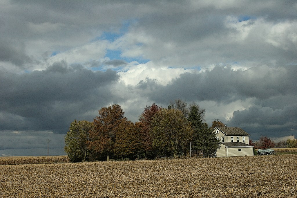 I see here trees huddled, protecting and sheltering that house from the elements. My thoughts turn introspective at this scene.