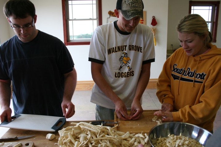Once out of the washing machine, the process of chopping the horseradish begins.