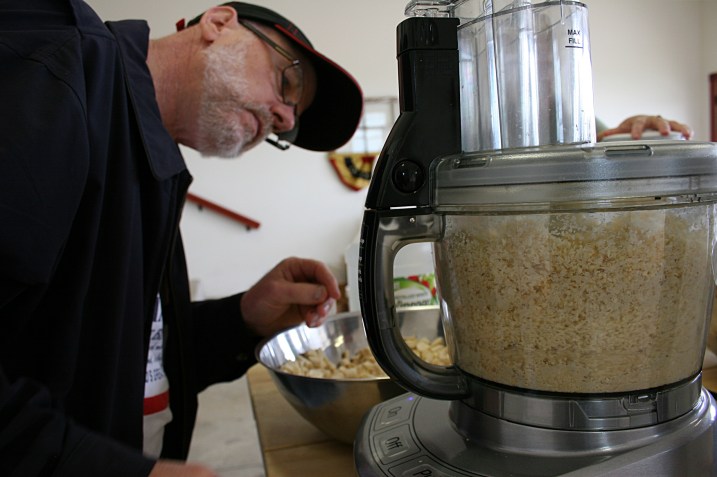 Next, the horseradish pieces go into the food processor, operated here by my husband, Randy.