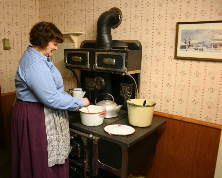 Mrs. Morris supposedly cooking applesauce.