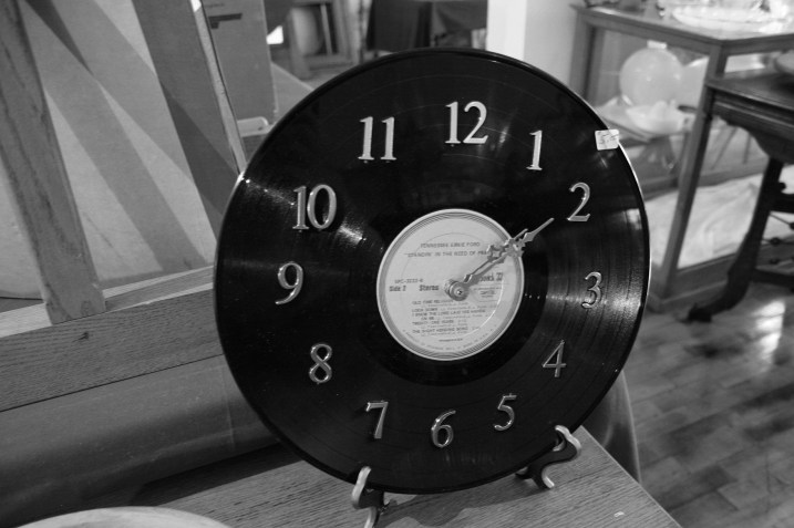 Oh, how I wish I had bought this clock, crafted by Don's mom (recently deceased) from an old album.