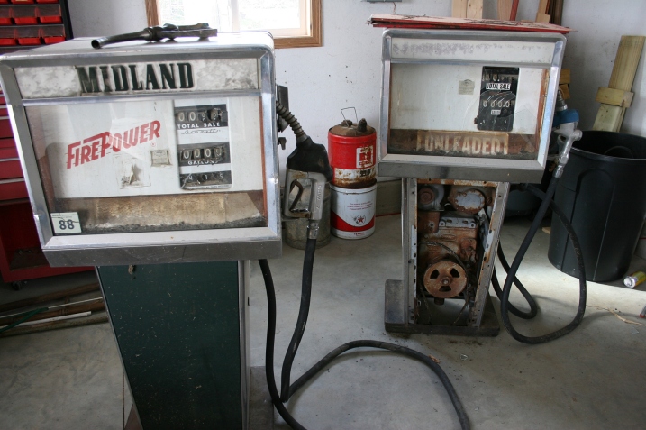 The vintage Midland gas pumps purchased by my Uncle Milan at the gas station auction. My brother Brian recently bought the pumps from Milan with plans to restore them.