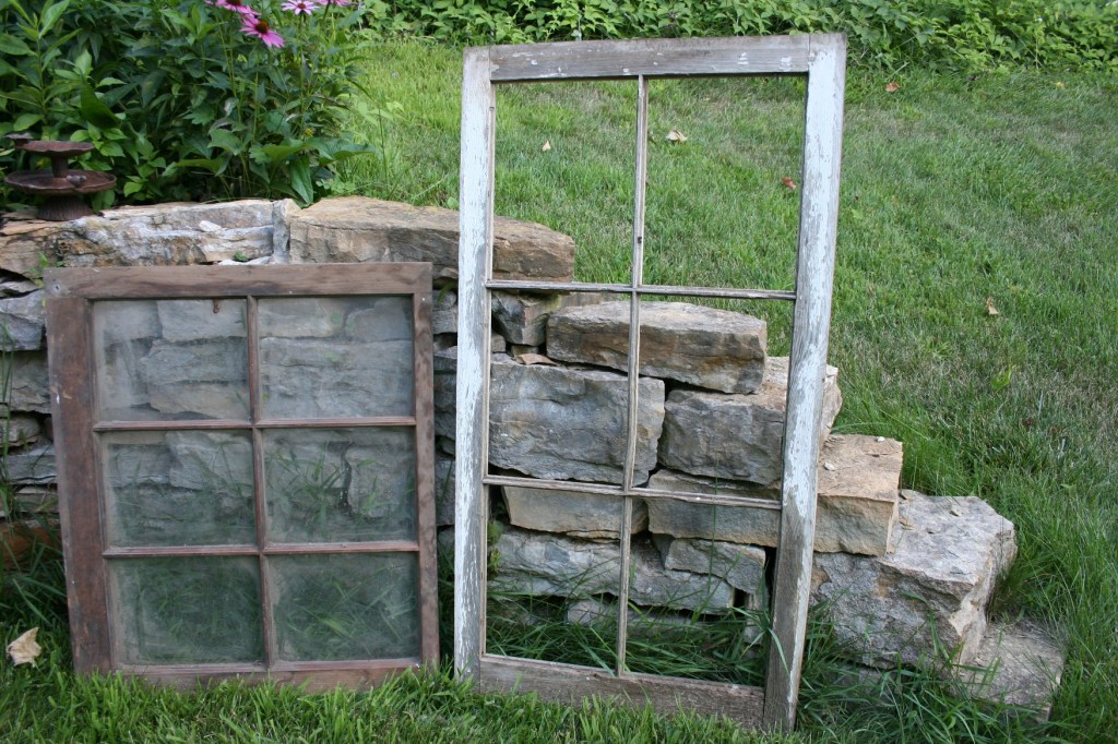 First the bride considered using old picture frames to hold guests' seating place cards. But then I remembered two old barn window frames stashed in our garage. One came from the Helbling family farm, where my husband grew up, and the other from my childhood farm. Perfect.