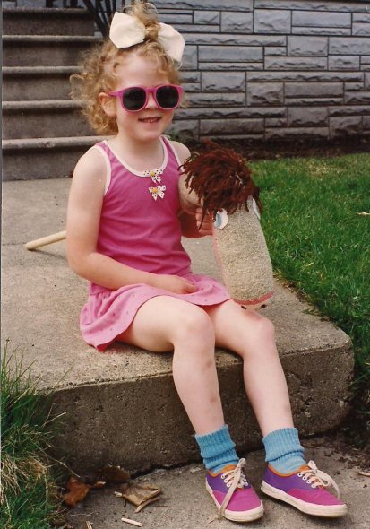 As a little girl, Miranda was all girly girl, wearing only skirts and donning ribbons in her hair. She also loved horses, including her stick horse, shown here in a photo taken when she was 5 1/2.