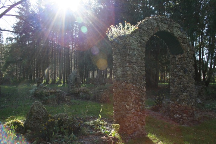 Sculpture, lens flare on arch