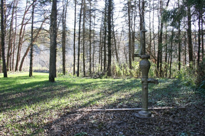 As I walked away from the sculpture garden toward the Zumbro River, I spotted this charming old water pump. I moved closer, until my husband stopped me in my tracks. We saw boards lying across the ground around the pump, an indication that this might not be a safe place to walk.