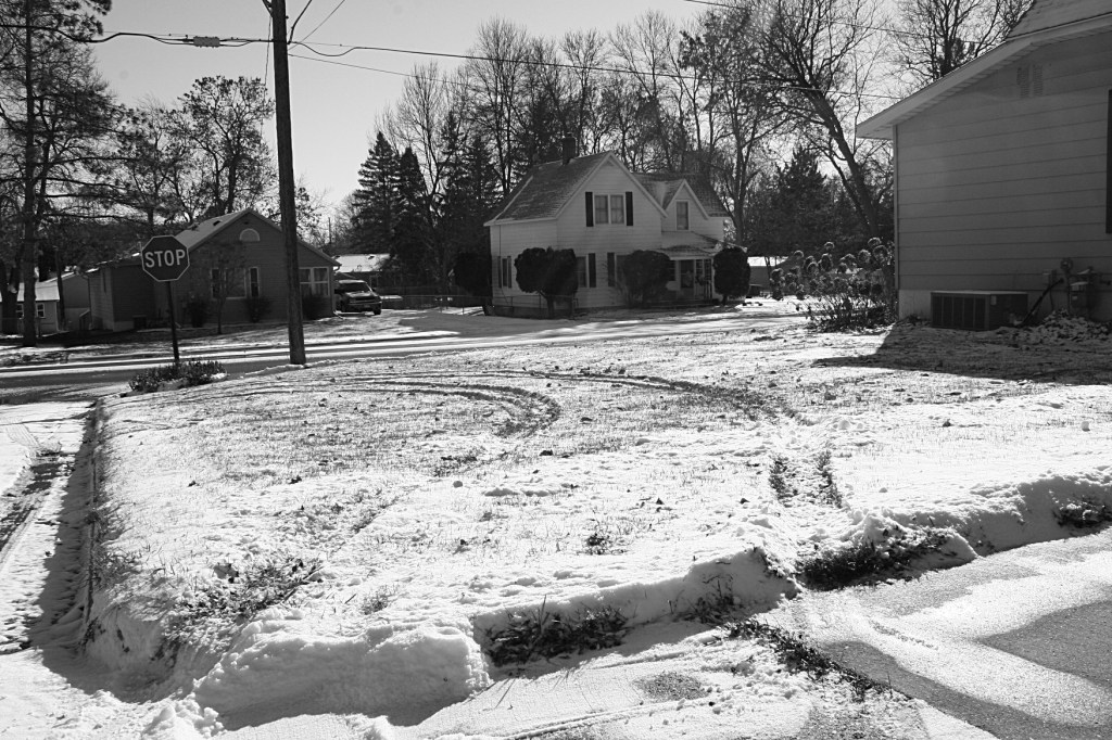 That's the corner of my house on the right with the vehicle tracks in the snow nearly half way into my side yard.