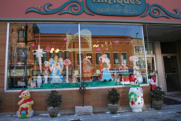 Merchandise displayed outside of an antique store.