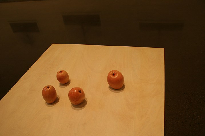 I love the simplicity of the apples positioned on the table in Rath's exhibit and how the shadows angle onto the tabletop.