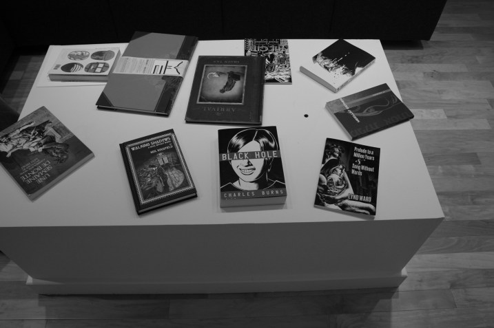 More tabletop art, to be picked up and paged through by gallery visitors.