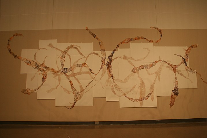 A wall-size artistic interpretation of Opuntia by Laura Cooper.