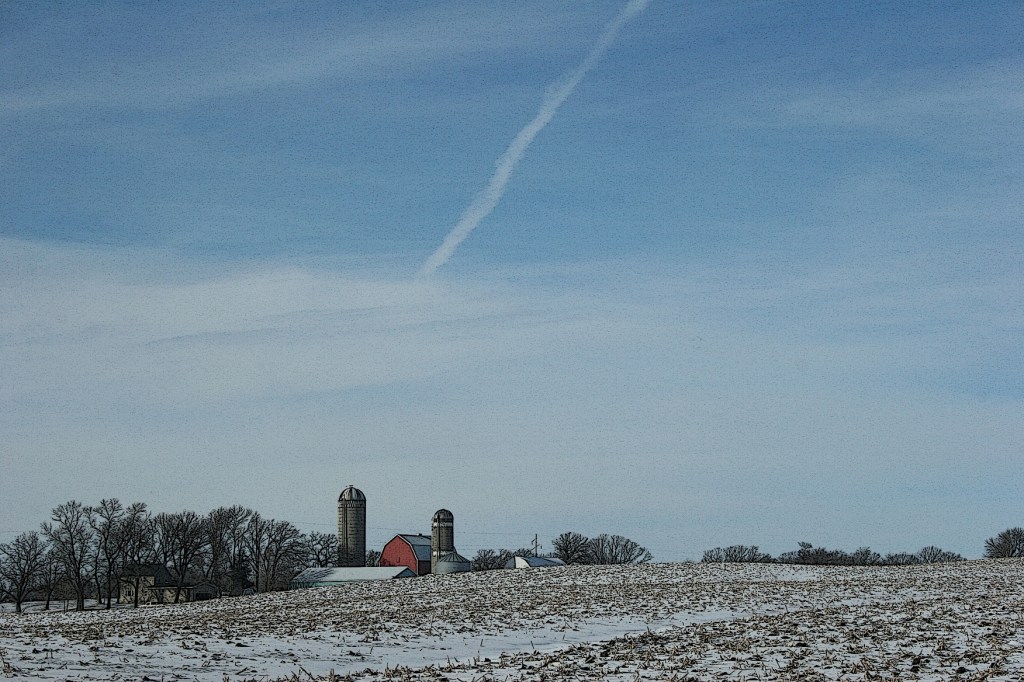 The rural scene unfolds before us.