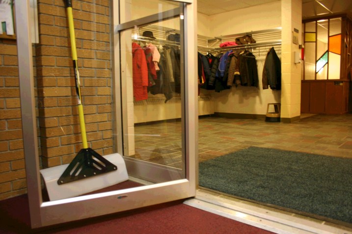 A snow shovel at the ready at St. Luke's Church, Faribault.