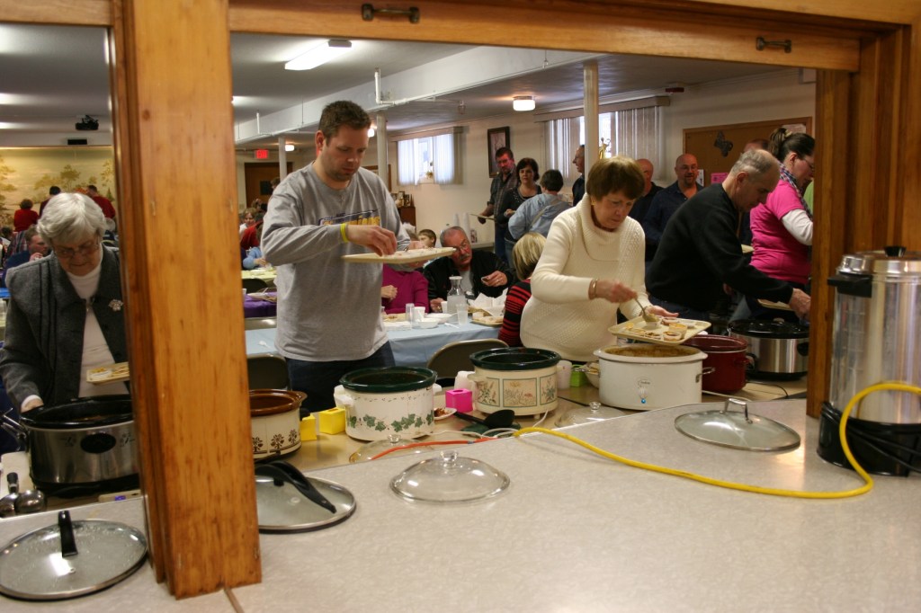 A line forms near the church kitchen.