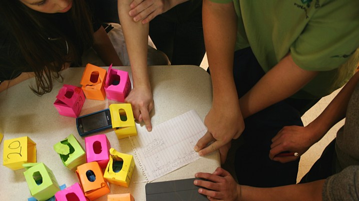 Trinity's youth count the votes.