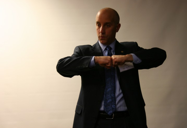 Diver Jim Christian gestures as he provides information on the iron ore carrier and theories on why it sank.