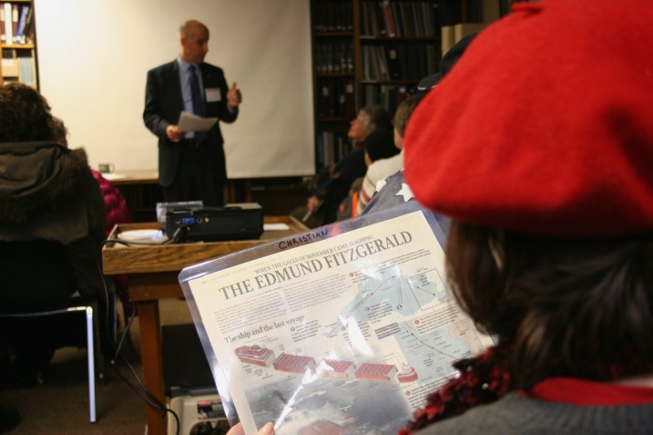 Newspaper clippings about The Fitz were passed among audience members while Jim Christian spoke.