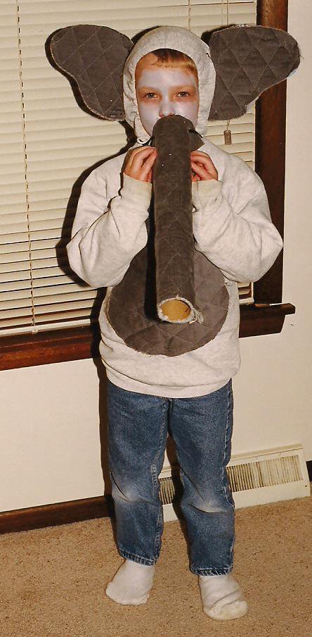 At age five, the son dressed as an elephant for Halloween. Today he attends Tufts University. The university mascot is Jumbo the elephant.