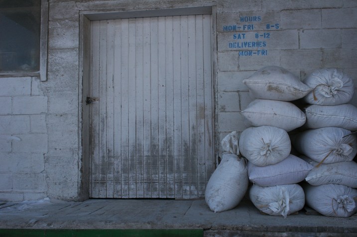 Feed mill, bags of feed