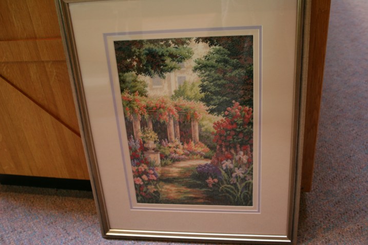 Church secretary Jennie Kingland created this lush detailed floral in counted cross stitch. 